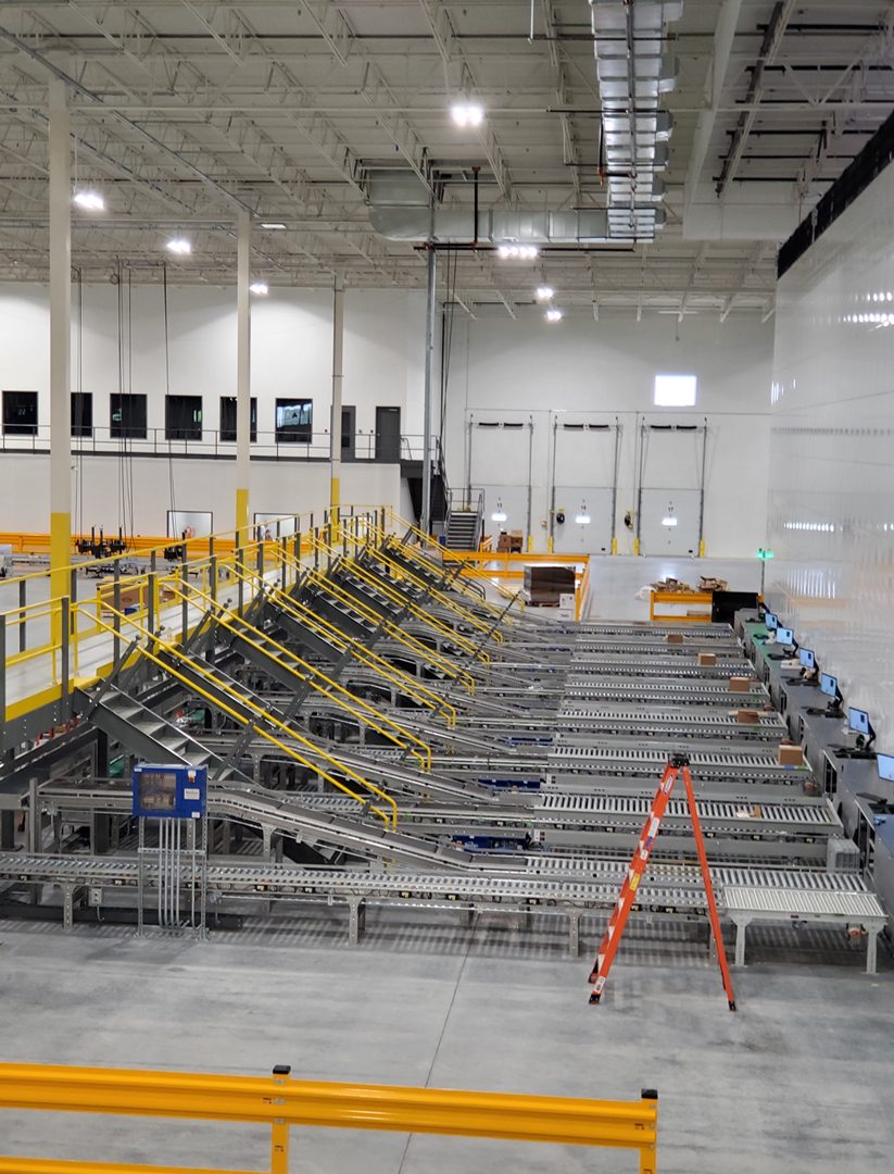 Conveyor system being installed in a warehouse